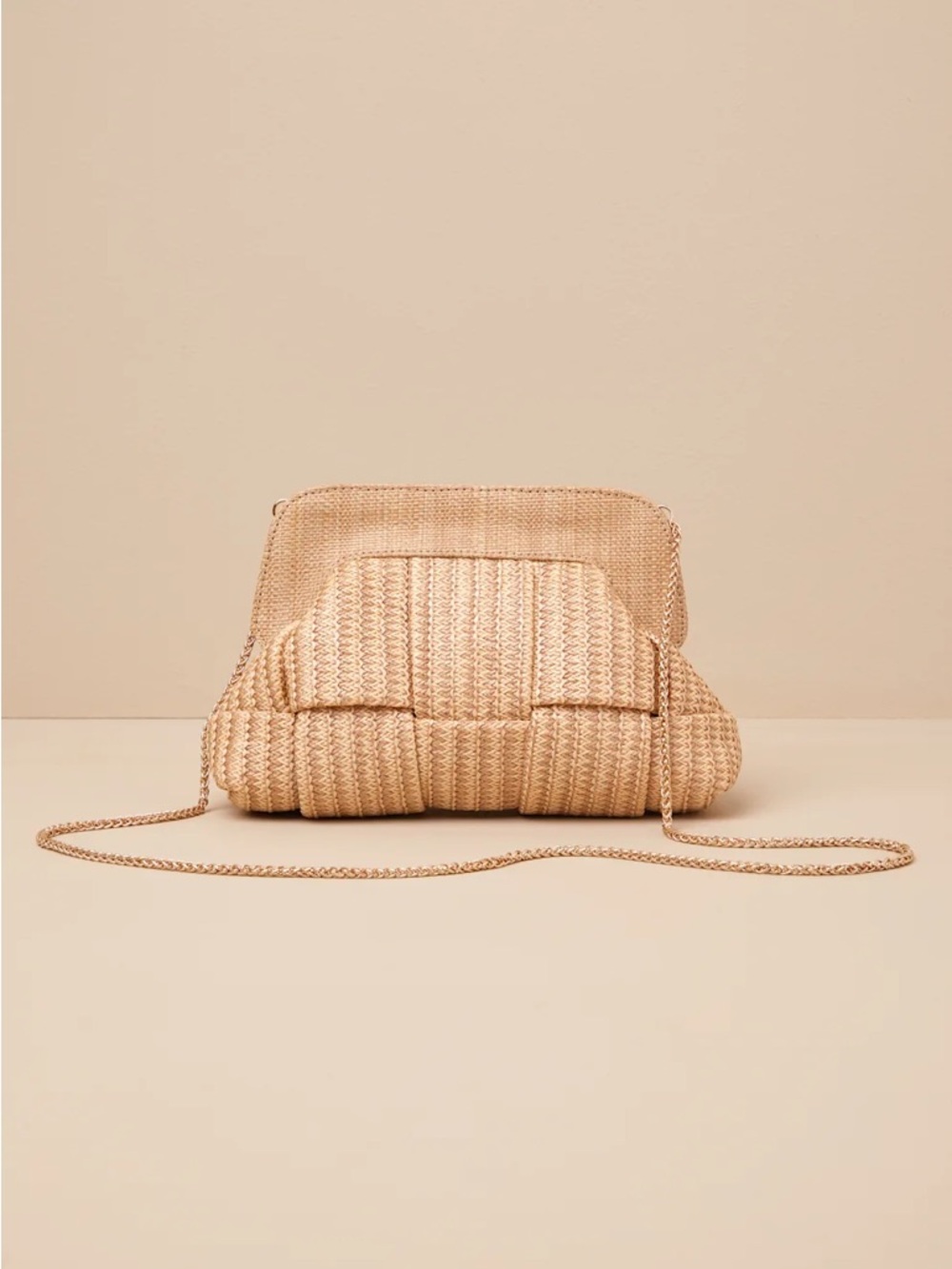 Beige woven crossbody clutch